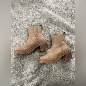 Tan ankle bootie worn